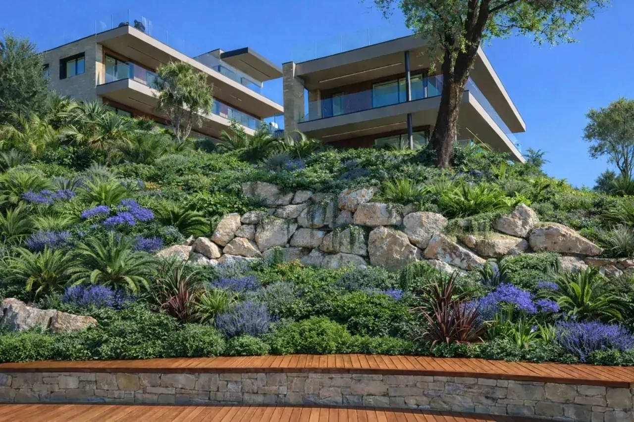 Modern residences on slope with garden and wooden terrace