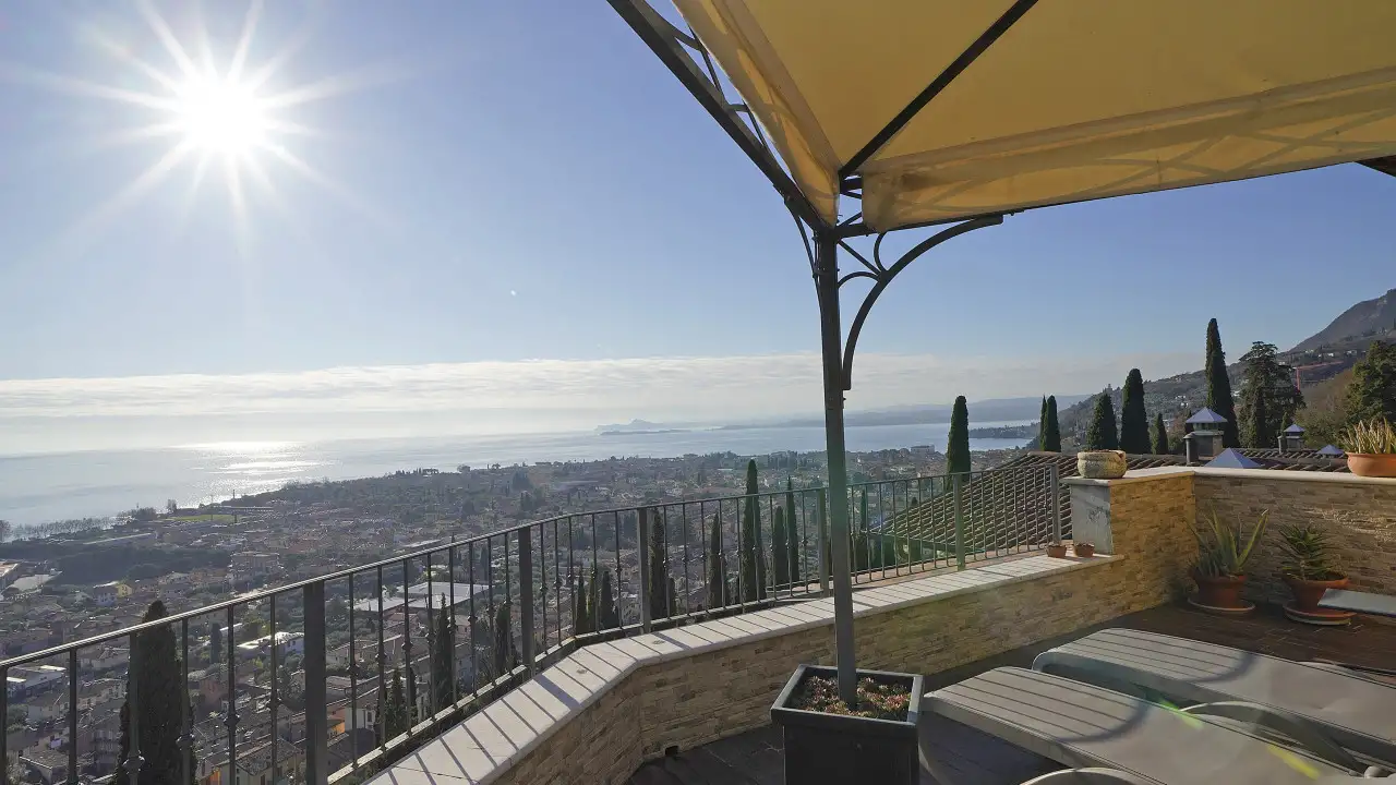Terrace with panoramic lake view and sun