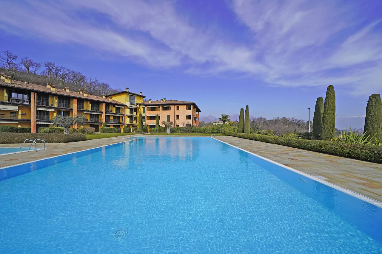 Rectangular swimming pool in residence with clear sky