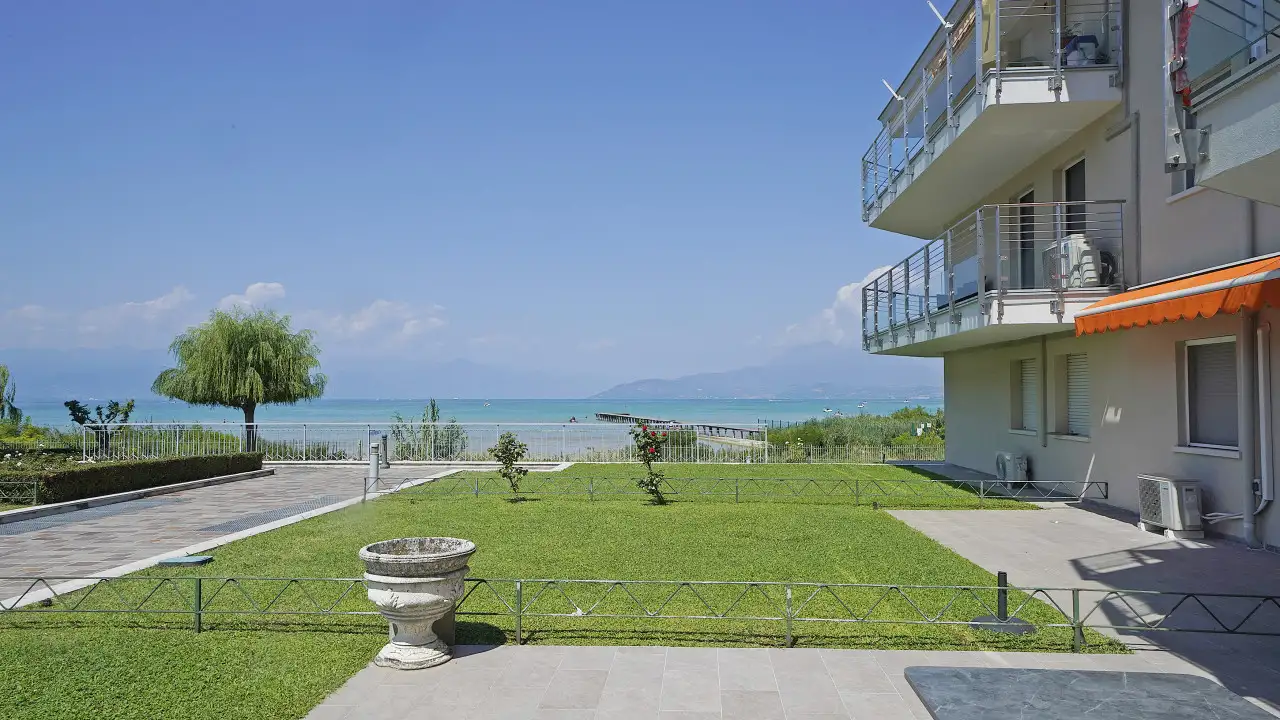Garden with lawn and lake view