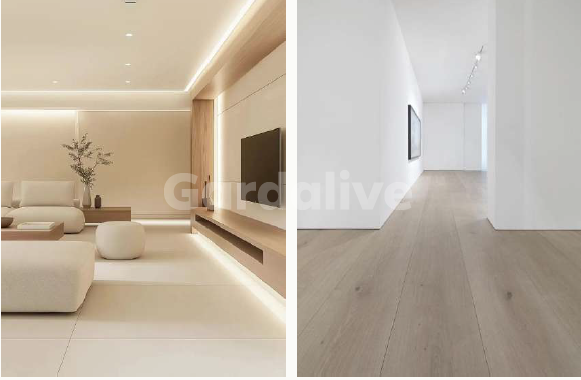 Wohnzimmer mit hellen Sofas und eingebauter LED-Beleuchtung